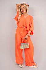 Load image into Gallery viewer, V-Neck Wide Sleeve Jumpsuit with Ring Front Detail
