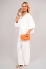 Load image into Gallery viewer, V-Neck Wide Sleeve Jumpsuit with Ring Front Detail
