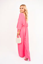 Load image into Gallery viewer, Wide Leg V Neck Jumpsuit with Back Tie Detail
