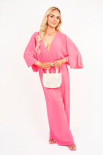 Load image into Gallery viewer, Wide Leg V Neck Jumpsuit with Back Tie Detail
