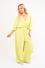 Load image into Gallery viewer, Wide Leg V Neck Jumpsuit with Back Tie Detail
